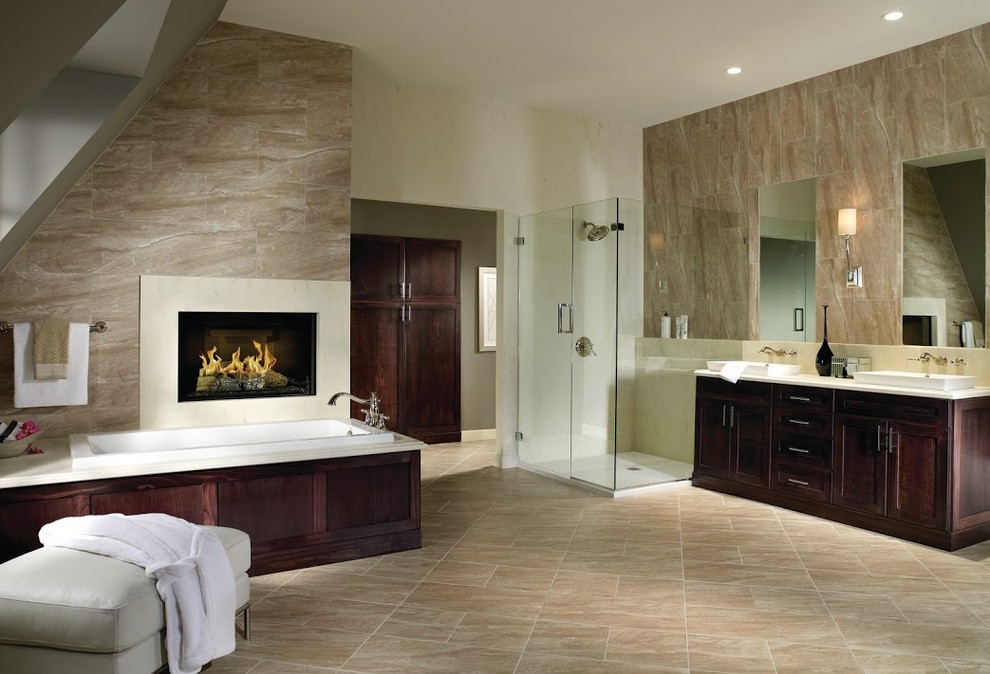 Inspiration for a contemporary bathroom in Indianapolis with dark wood cabinets, a drop-in tub, a corner shower, ceramic tile, beige walls, ceramic floors, a drop-in sink, shaker cabinets and marble benchtops.