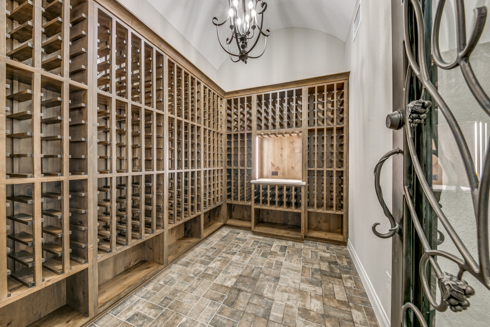 This is an example of a mediterranean wine cellar in Austin.