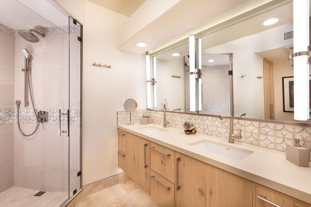 Mid-sized contemporary master bathroom in Other with flat-panel cabinets, light wood cabinets, a corner shower, brown tile, limestone, white walls, wood-look tile, an undermount sink, quartzite benchtops, brown floor, a hinged shower door, beige benchtops, a double vanity and a floating vanity.