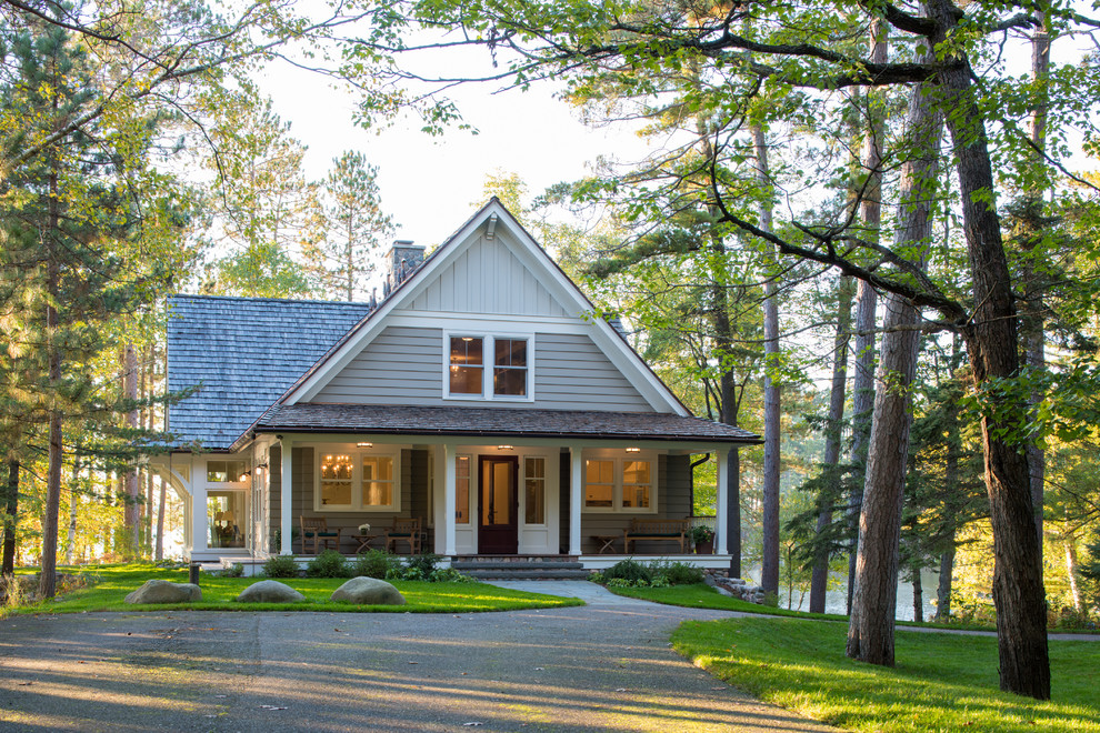 Inspiration for a timeless gray two-story wood gable roof remodel in Minneapolis