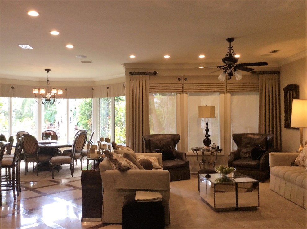Home design - mid-sized transitional open concept travertine floor home design idea in Austin with beige walls