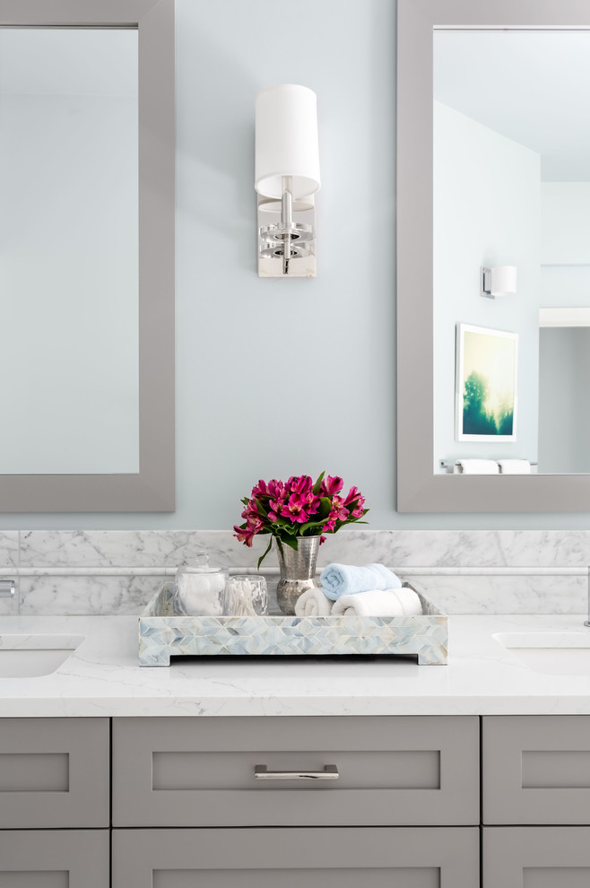 Inspiration for a mid-sized transitional master bathroom in Seattle with shaker cabinets, grey cabinets, a freestanding tub, an open shower, a two-piece toilet, white tile, marble, grey walls, marble floors, an undermount sink, engineered quartz benchtops, white floor, an open shower and white benchtops.