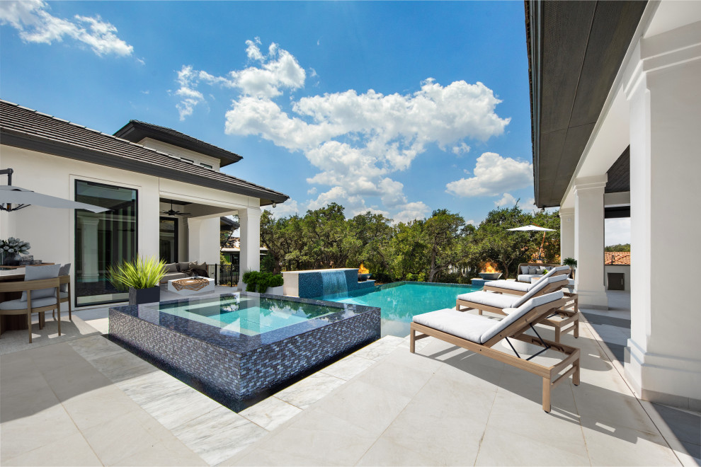 Inspiration for a transitional pool remodel in Austin