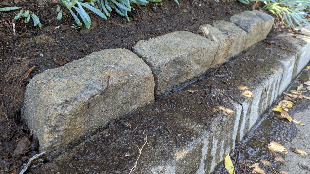 How to Secure a Paver Block Against Street Curb
