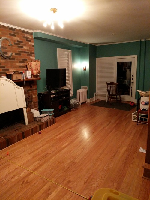  Long  very narrow  living  room  with fireplace  staircase