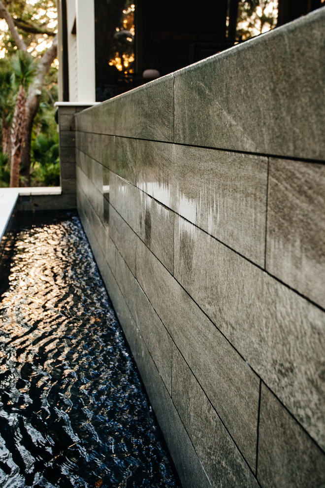 Inspiration for a large transitional backyard deck remodel in Charleston with no cover