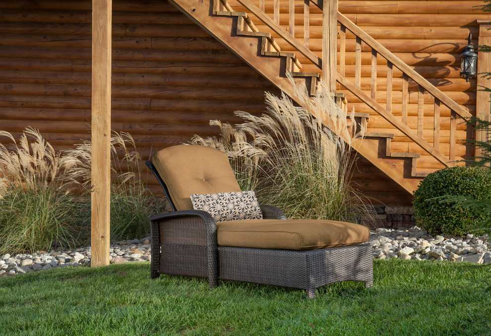 Inspiration for a transitional backyard home design remodel
