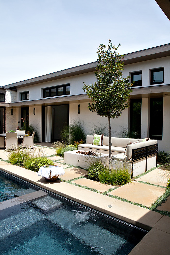 Design ideas for a contemporary pool in Orange County.
