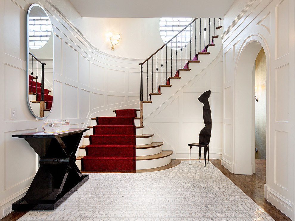 Design ideas for a traditional foyer in New York with white walls.