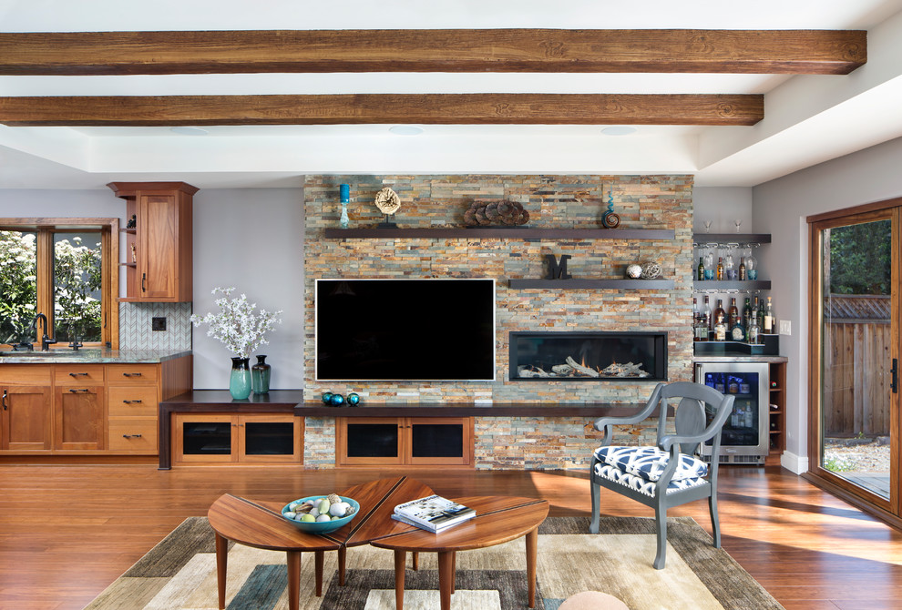 Inspiration for a transitional open concept family room in San Francisco with a home bar and a brick fireplace surround.