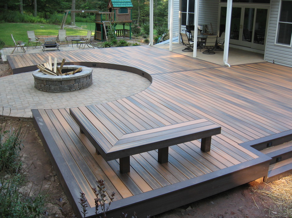 Mid-sized traditional backyard deck in Baltimore with a fire feature and no cover.