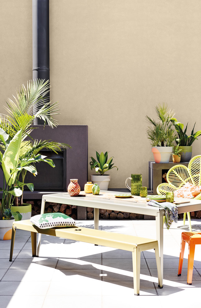 Design ideas for a large contemporary backyard patio in Melbourne with a fire feature.