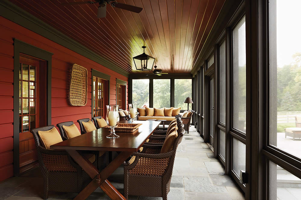 Traditional verandah in Minneapolis with a roof extension.
