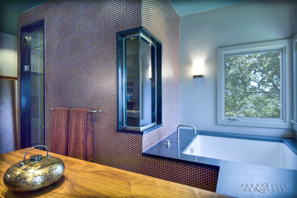 Inspiration for a large midcentury master bathroom in Other with a vessel sink, flat-panel cabinets, dark wood cabinets, granite benchtops, a japanese tub, green tile, ceramic tile, green walls and travertine floors.