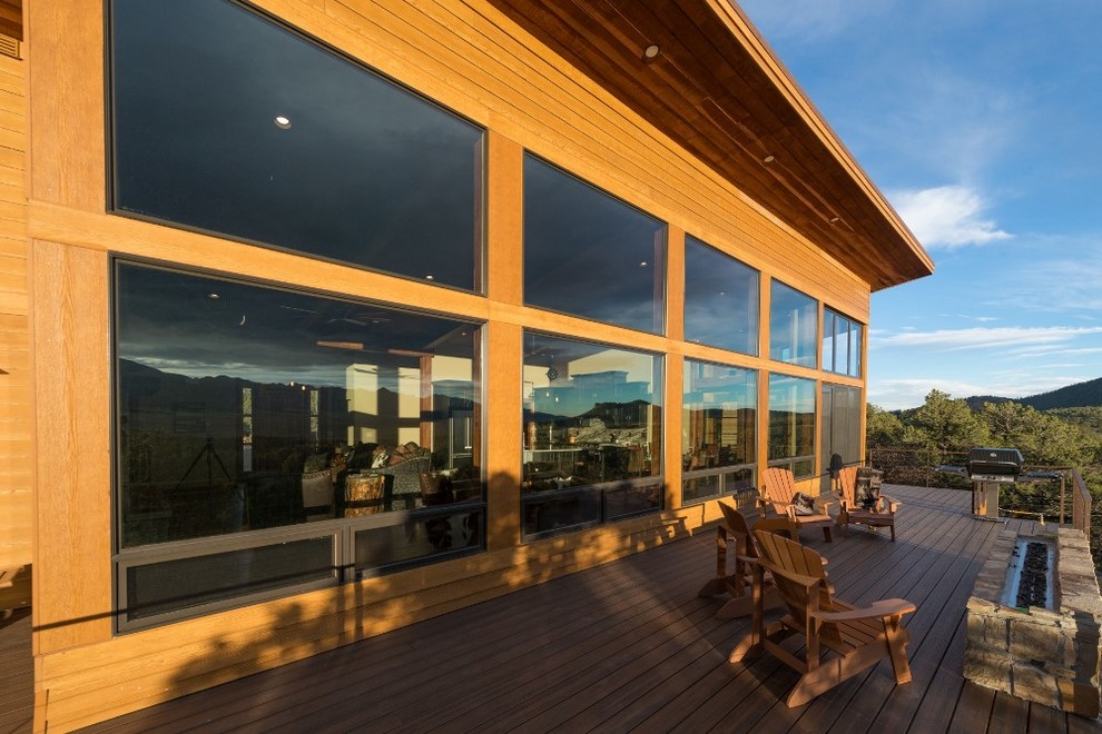 Mountain style home design photo in Denver