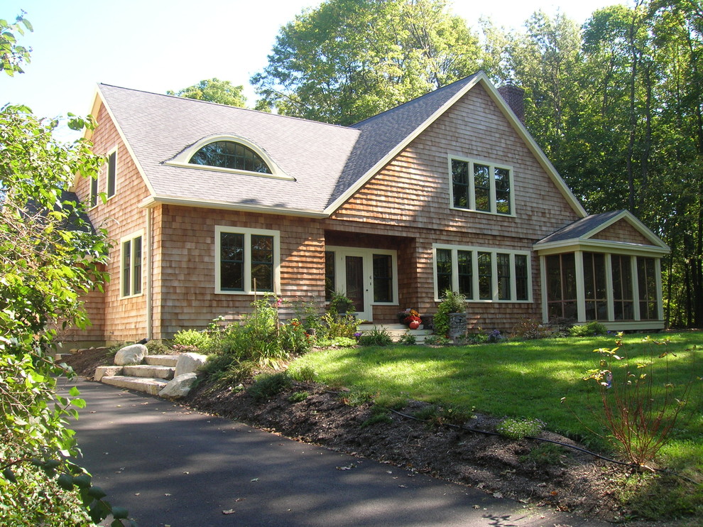 Photo of a mid-sized traditional two-storey exterior in Boston with wood siding.