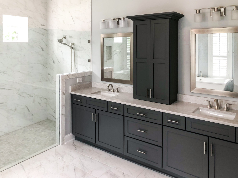 Design ideas for a large country master bathroom in Jacksonville with shaker cabinets, dark wood cabinets, a freestanding tub, an open shower, gray tile, porcelain tile, porcelain floors, an undermount sink, quartzite benchtops, grey floor, a hinged shower door, beige benchtops, a shower seat, a double vanity and a built-in vanity.