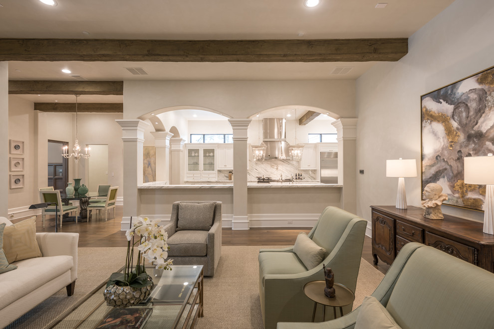 Inspiration for an expansive traditional open concept family room in Dallas with medium hardwood floors, a stone fireplace surround and no tv.