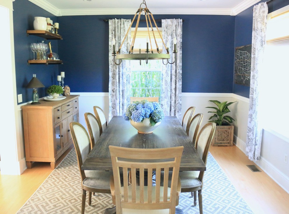 Design ideas for a large traditional enclosed dining room in Bridgeport with blue walls, light hardwood flooring, no fireplace and brown floors.