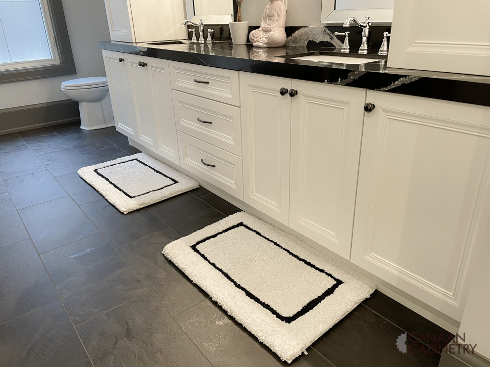 Example of a transitional home design design in Toronto