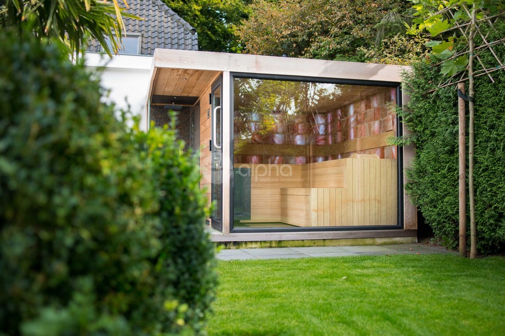 Mid-sized minimalist backyard outdoor shower deck photo in Los Angeles with a roof extension