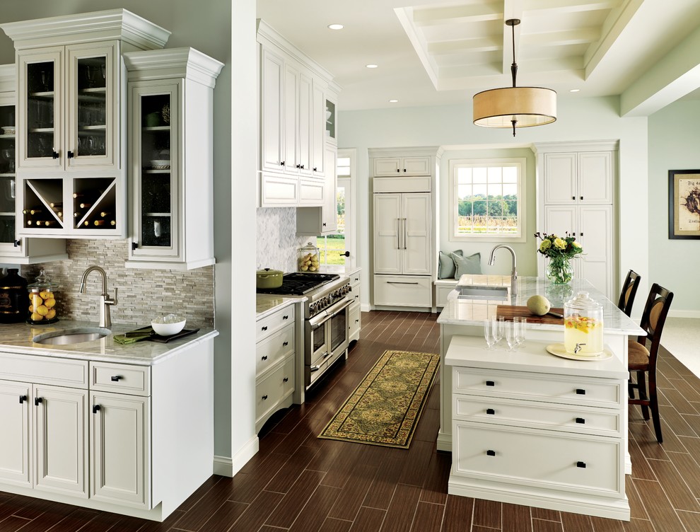 Example of a large transitional eat-in kitchen design in Toronto with white cabinets, gray backsplash, stainless steel appliances and an island