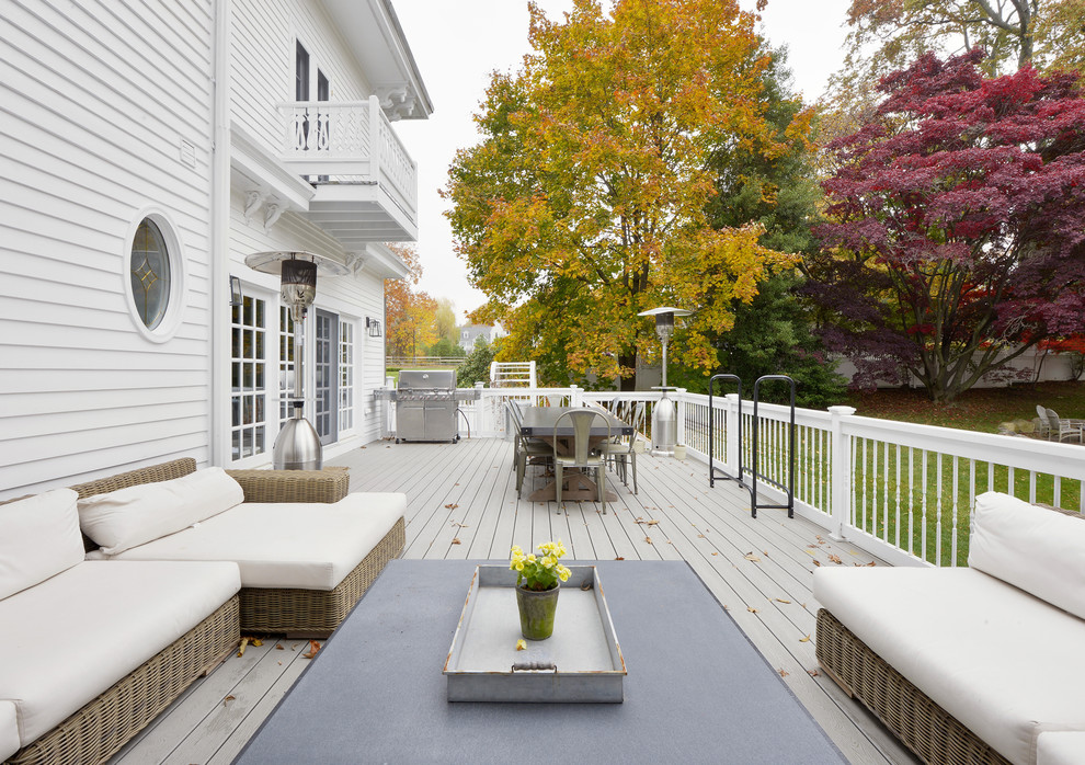 Photo of a large traditional backyard deck in New York with no cover.