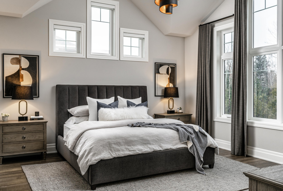 Design ideas for a transitional master bedroom in Other with medium hardwood floors.