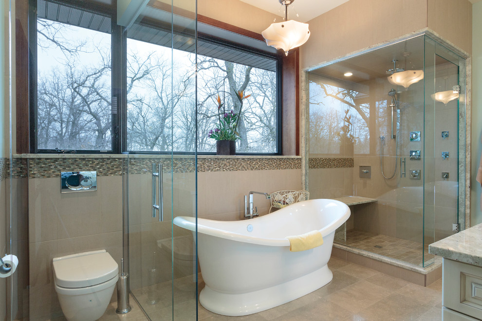 Photo of an expansive master bathroom in Other with beaded inset cabinets, white cabinets, a freestanding tub, a corner shower, a wall-mount toilet, beige tile, porcelain tile, blue walls, porcelain floors, an undermount sink, granite benchtops, beige floor, a hinged shower door and yellow benchtops.