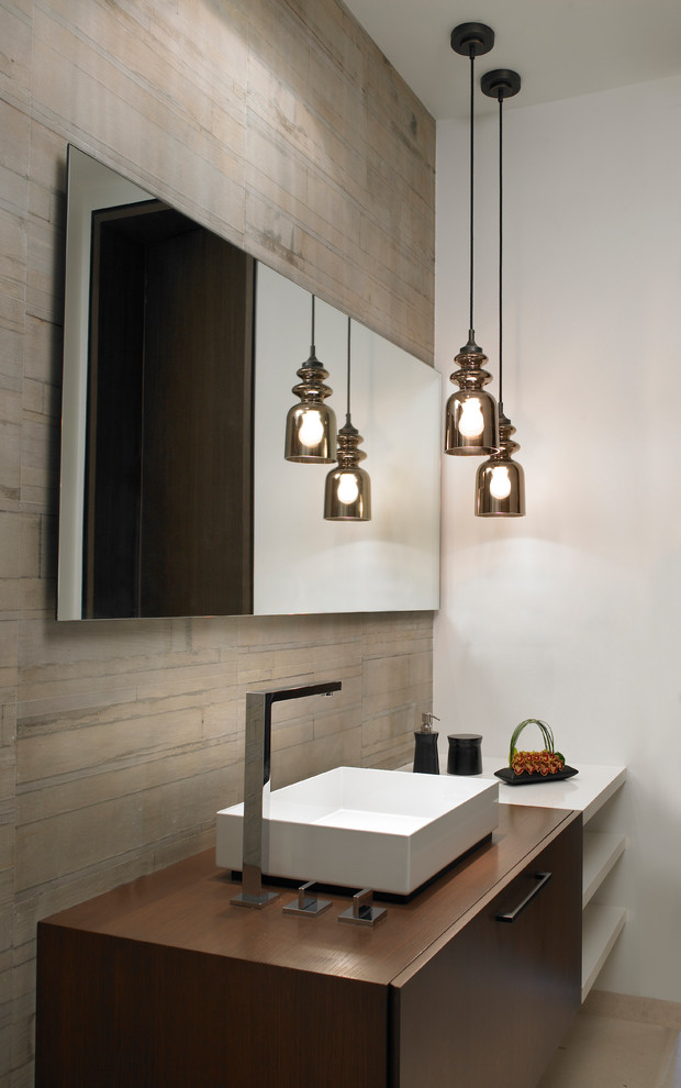 Design ideas for a mid-sized contemporary powder room in Miami with dark wood cabinets, beige tile and wood benchtops.