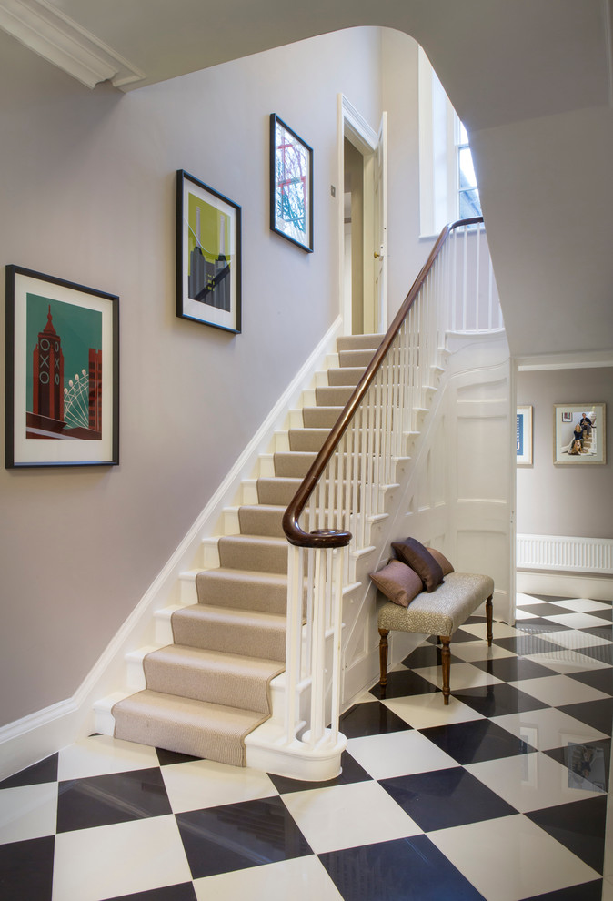 Design ideas for a traditional carpeted straight staircase in Oxfordshire with carpet risers.