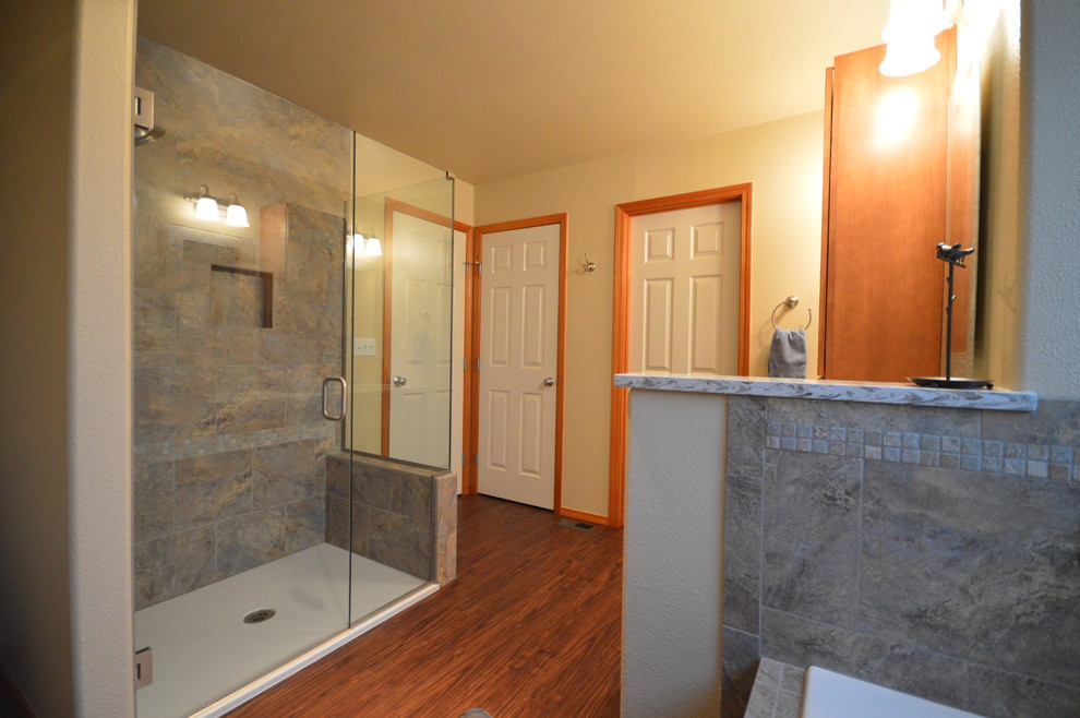 Large contemporary master bathroom in Seattle with an undermount sink, shaker cabinets, dark wood cabinets, quartzite benchtops, a drop-in tub, a curbless shower, a two-piece toilet, multi-coloured tile, ceramic tile, beige walls and linoleum floors.