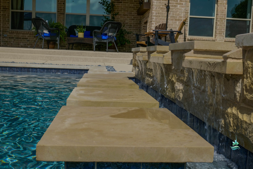 Huge tuscan backyard custom-shaped infinity pool landscaping photo in Dallas with decking