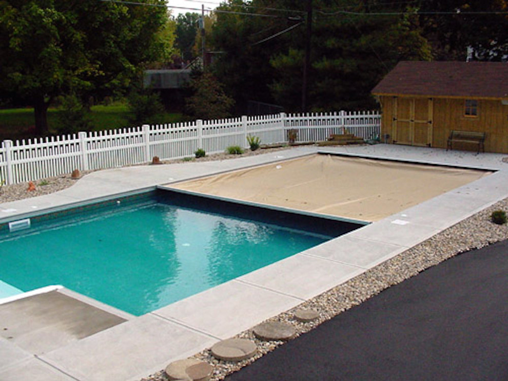 Inspiration for a large concrete and rectangular pool remodel in Miami
