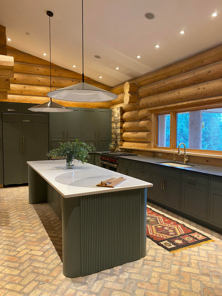 Example of a large trendy l-shaped kitchen pantry design in Denver with shaker cabinets, green cabinets, marble countertops, an island and black countertops