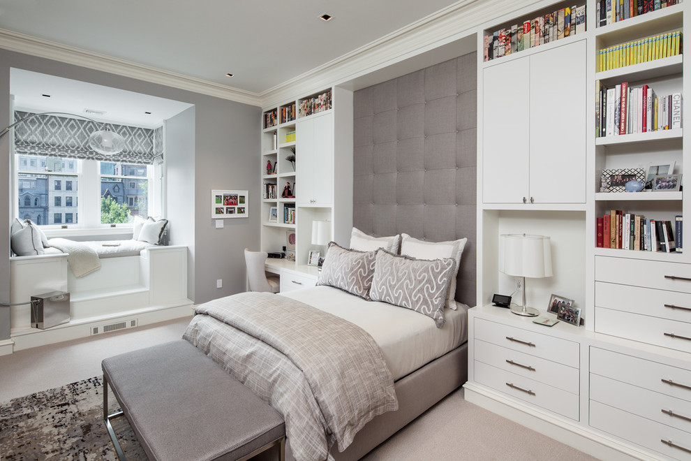 Photo of a transitional bedroom in Boston with grey walls and carpet.