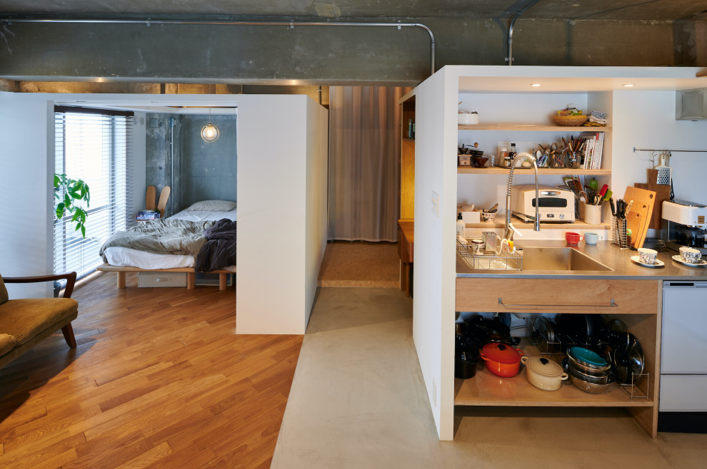 Medium sized urban single-wall open plan kitchen in Tokyo with an integrated sink, open cabinets, beige cabinets, stainless steel worktops, white splashback, tonge and groove splashback, white appliances, concrete flooring, no island, grey floors, grey worktops and a timber clad ceiling.
