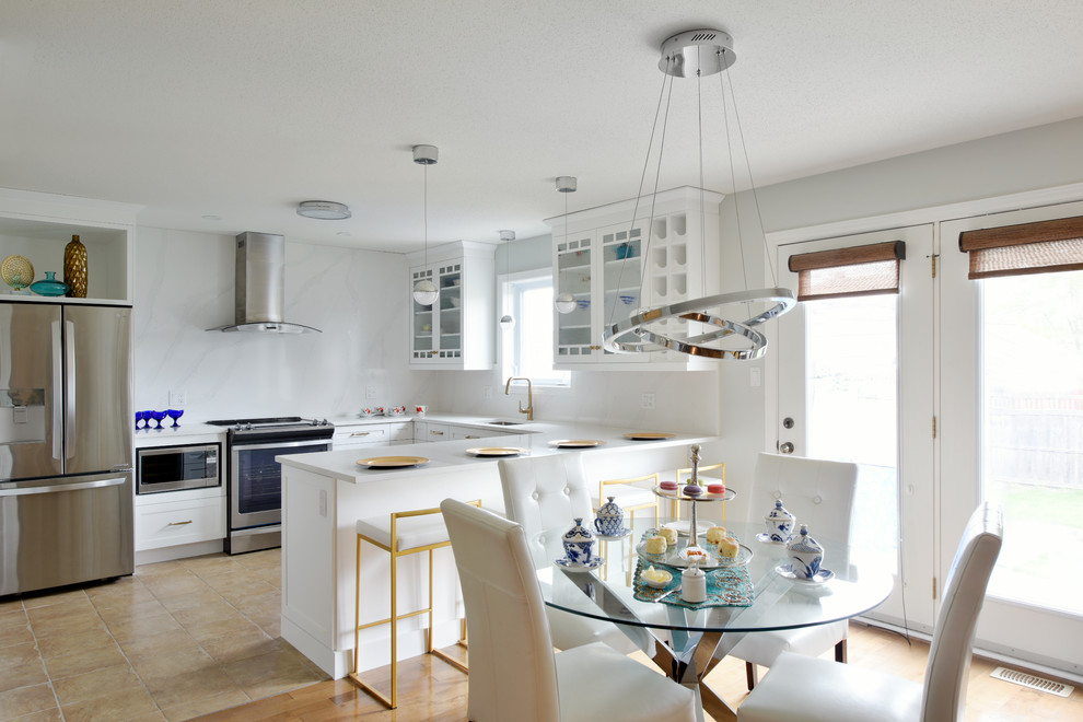 Example of a transitional kitchen design in Toronto
