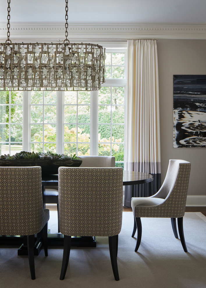 Inspiration for a mid-sized transitional dark wood floor and brown floor dining room remodel in Chicago with gray walls and no fireplace