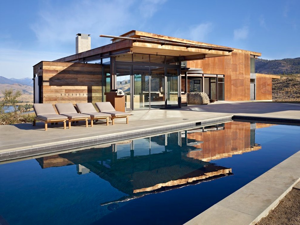Design ideas for a contemporary pool in Seattle.