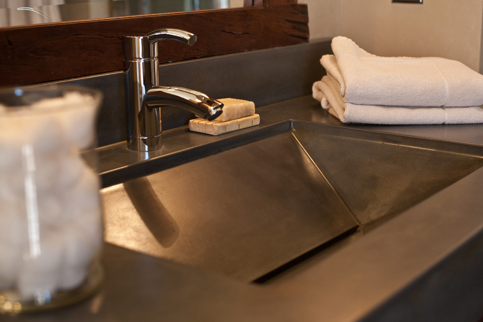 Home design - rustic home design idea with a trough sink, furniture-like cabinets and concrete countertops