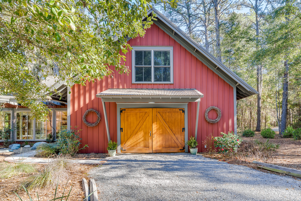 Design ideas for a country one-storey red exterior in Atlanta with a gable roof.