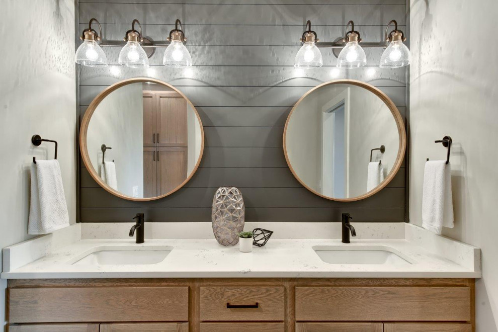 Transitional master double-sink bathroom photo with shaker cabinets, light wood cabinets and a built-in vanity
