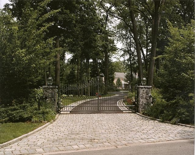 Driveway Entrance with Custom Iron Gates, Stone Piers and ...