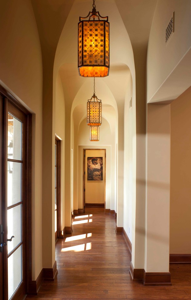 Inspiration for a mediterranean hallway in Tampa with beige walls.