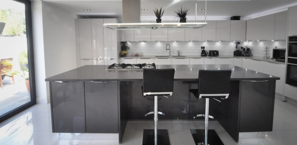 Contemporary kitchen in Buckinghamshire with an undermount sink, quartzite benchtops, porcelain floors and with island.