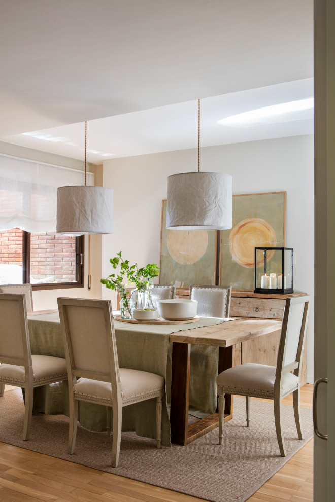 Photo of a transitional dining room in Other.