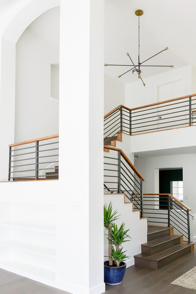 Example of a transitional home design design in Austin