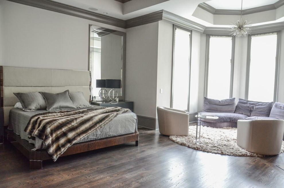 This is an example of a mid-sized contemporary master bedroom in Atlanta with grey walls, dark hardwood floors and no fireplace.