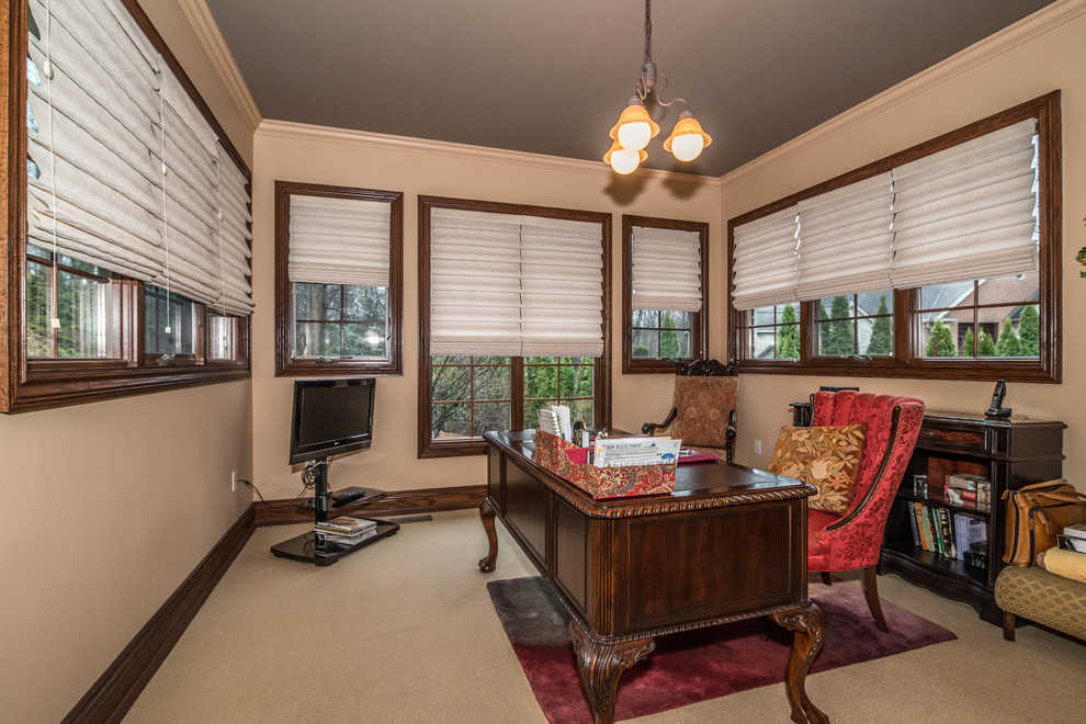 Large traditional home office in Detroit.